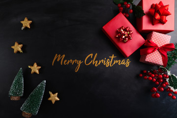 Fototapeta na wymiar Merry Christmas, xmas present gift and decoration on black background