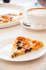 One slice of mexican pizza with hot chili peppers