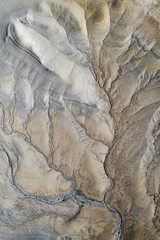 Aerial texture on the earth. Rivers. Gray color. Utah landscape. USA country