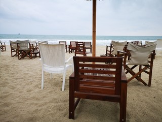 table and chairs on the beach