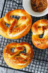 Pretzels with oregano on wire rack. Top view.