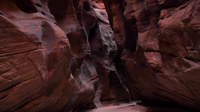 Camera Movement In Deep Slot Canyon With Curved And Smooth Sandstone Walls
