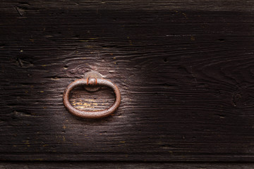 Old wooden door with knocker