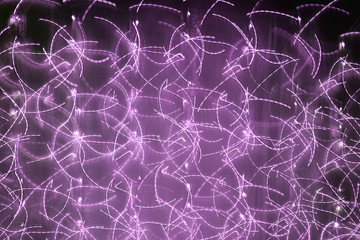 Abstract pattern created by interweaving curved lines.