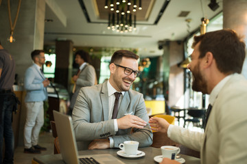 Business meeting in a cafe
