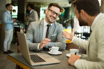 Business meeting in a cafe