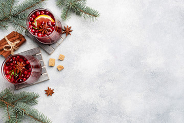 Cranberry juice with lemon and cane sugar. Winter hot drink. Copy space © Elenglush