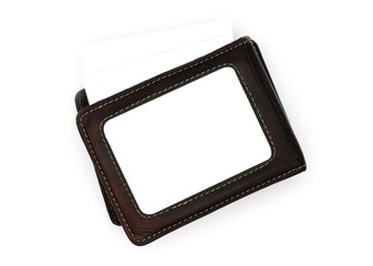 Brown leather wallet with blank credit card inside isolated on a white background