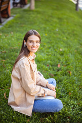 Beautiful woman waiting for her friend outside