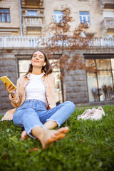 Pretty young woman enjoying her favorite song