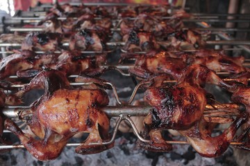 Filipino Dish Spit-Roasted Chicken or Litson Manok or Lechon Manok.