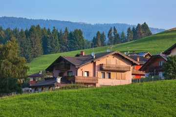 Fototapeta na wymiar Panoramic view to village in Asiago Plateau, Vicenza, Italy.
