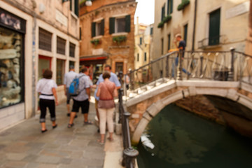 Fototapeta na wymiar Tourists in Venice, Italy. Blurred photography