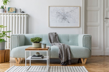 Stylish scandinavian living room interior with design mint sofa, furnitures, mock up poster map, plants, and elegant personal accessories. Home decor. Interior design. Template. Ready to use. 