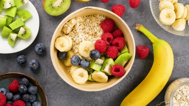 health food, healthy breakfast with muesli and fruits