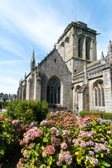 view of the historic and picturesque church of Saint Ronan in Locronan in Brittany