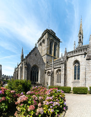 Fototapeta na wymiar view of the historic and picturesque church of Saint Ronan in Locronan in Brittany