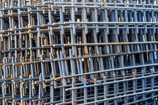 Industrial background. Rebar texture. Rusty rebar for concrete pouring. Steel reinforcement bars. Construction rebar steel work reinforcement. Closeup of Steel rebars.