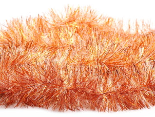 Orange tinsel, Christmas ornament, decoration isolated on white background