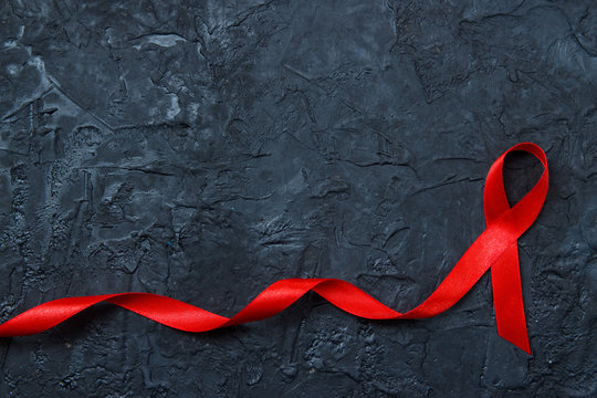 Hiv Day Red Ribbon Symbol Hiv World Day Dark Red Stock Photo by  ©Mvelishchuk 430076170