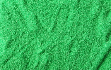 Green decorative sand pile for aquarium, background and texture