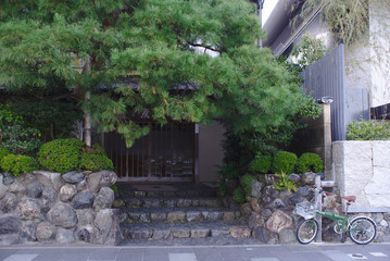 Beautiful coffee shop with bicycles parked in front of the shop in Asian countries.