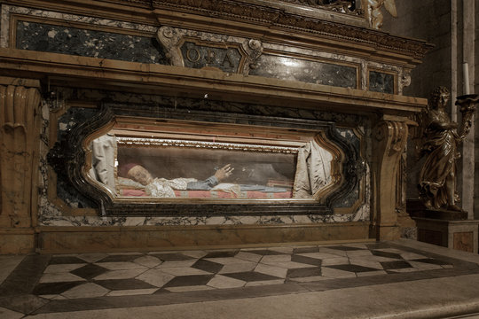 Lucca Tuscany Italy. Church interior. Cross Jesus Christ. Coffin with mummie.