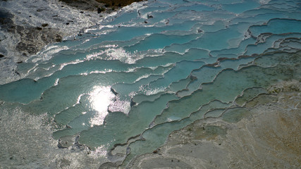 Natural travertine pools and terraces in Pamukkale. It is on the World Heritage List and is under...