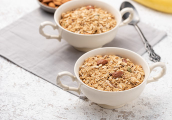 Granola, oatmeal with almond food background