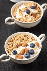 Granola, oatmeal with almond and berry food background