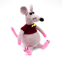 Knitted rat on a white background close-up