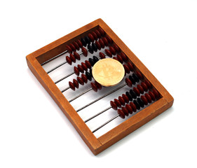 Wooden abacus with bitcoin on a white background