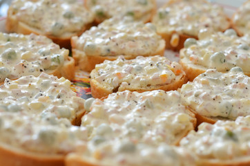 Russian salad canapes served on plate