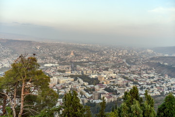 Obraz premium Old Tbilisi, Tbilisi, Georgia, October 17, 2019, Arial view of Tbilisi from Medieval castle of Narikala and Tbilisi city overview, Republic of Georgia, Caucasus region