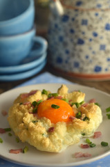 Baked egg with bacon and chives