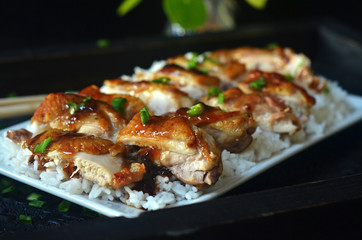 Chicken teriyaki on a white platter