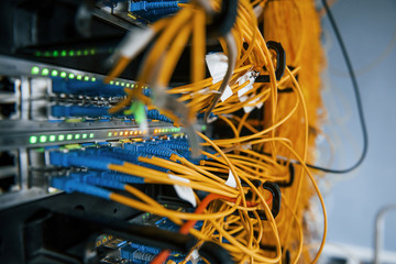 Close up view of internet equipment and cables in the server room
