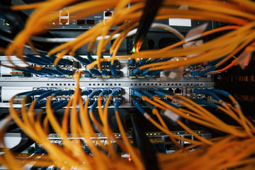 Close up view of internet equipment and cables in the server room