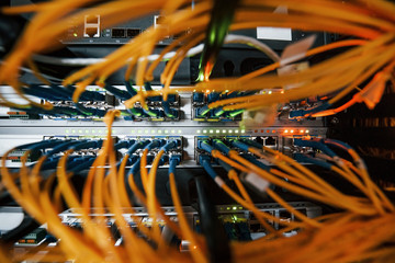 Close up view of internet equipment and cables in the server room
