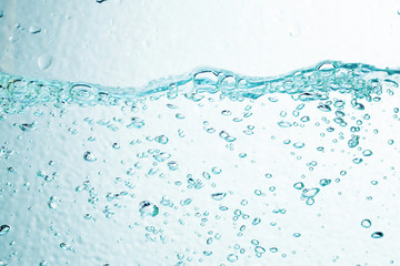 Closeup bubbles underwater on white background.