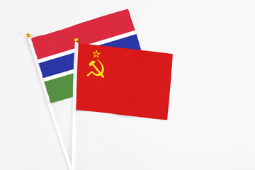 Soviet Union and Georgia stick flags on white background. High quality fabric, miniature national flag. Peaceful global concept.White floor for copy space.