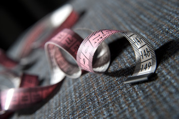 a tailor measure with fabric