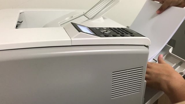 Motion action of printing document paper with laser printer, office working , work time