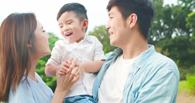 mom and kid touch forehead