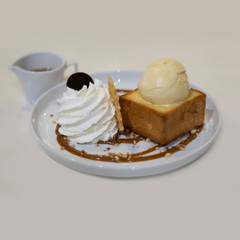 honey toast with vanilla ice-cream and whipped cream