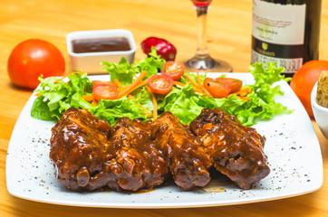 BBQ rib with vegetables, potatoes and wine