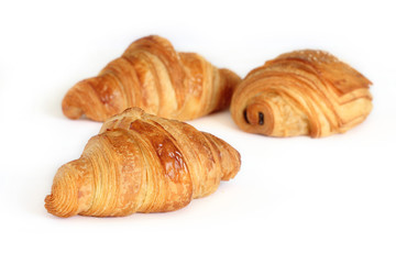 Group of french traditional pastry - pain au chocolat and croissants isolated on white background