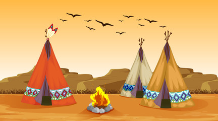 Scene with campfire and tents in the desert © GraphicsRF