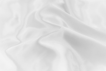 Soft focus of white color silk fabricl background texture.