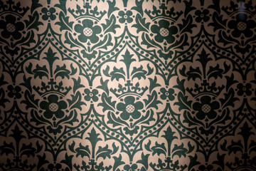 Fototapeta premium Repeating wallpaper pattern in the style of William Morris and the English Arts and Crafts tradition.